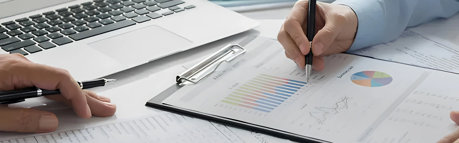 Financial analysts reviewing credit charts and reports