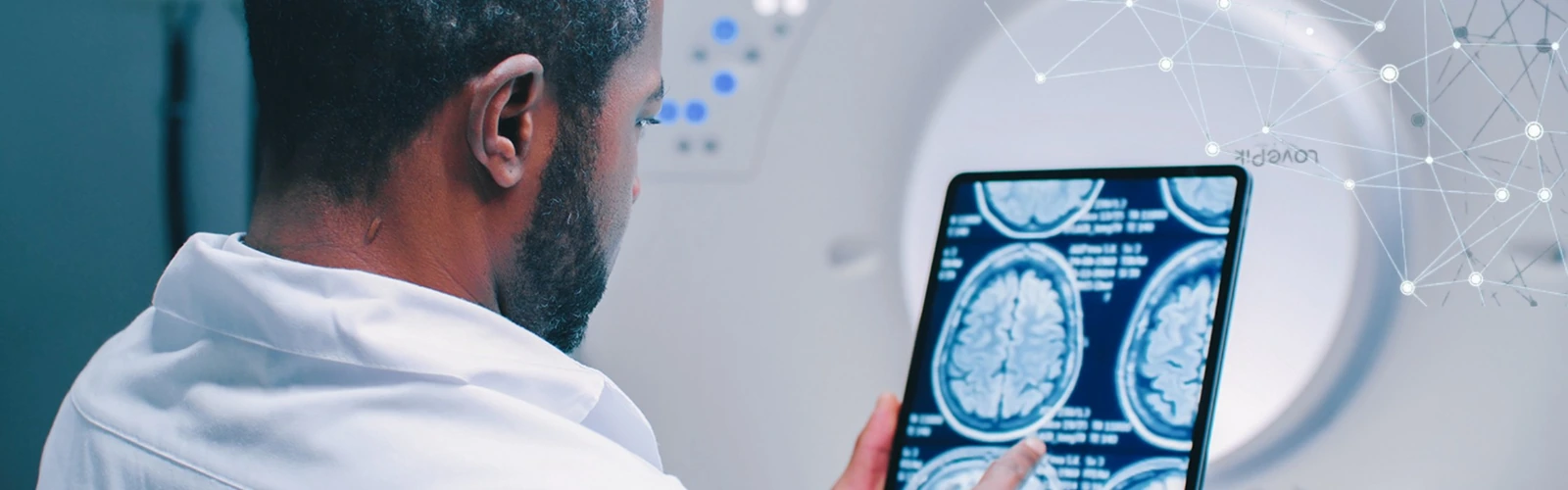 A clinician reviewing a liver scan on a tablet with an AI network overlay